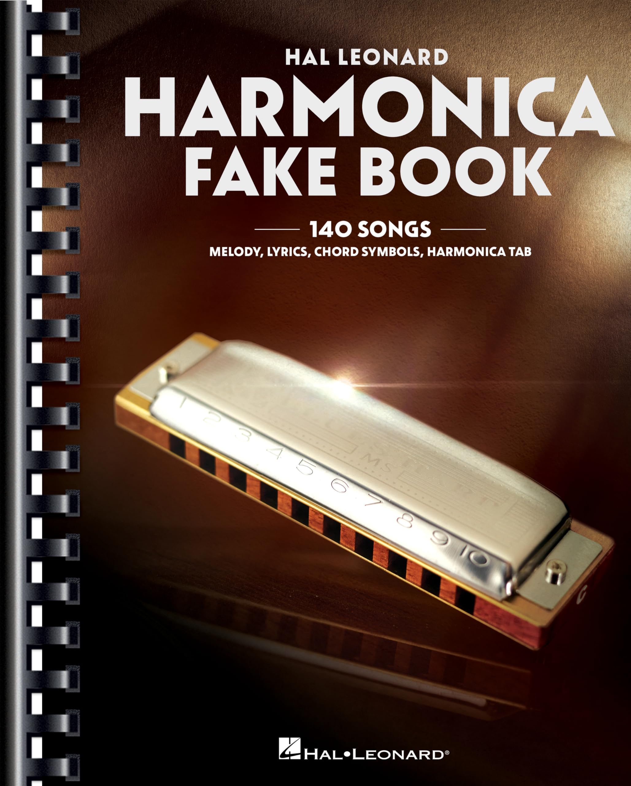 Cover of Harmonica Fake Book | 140-Song Melodies and Accurate Transcriptions for 10-Hole Diatonic C Harp | Blues Country Folk and Pop Sheet Music Book with Chord Symbols and Tabs for Beginners to Professional